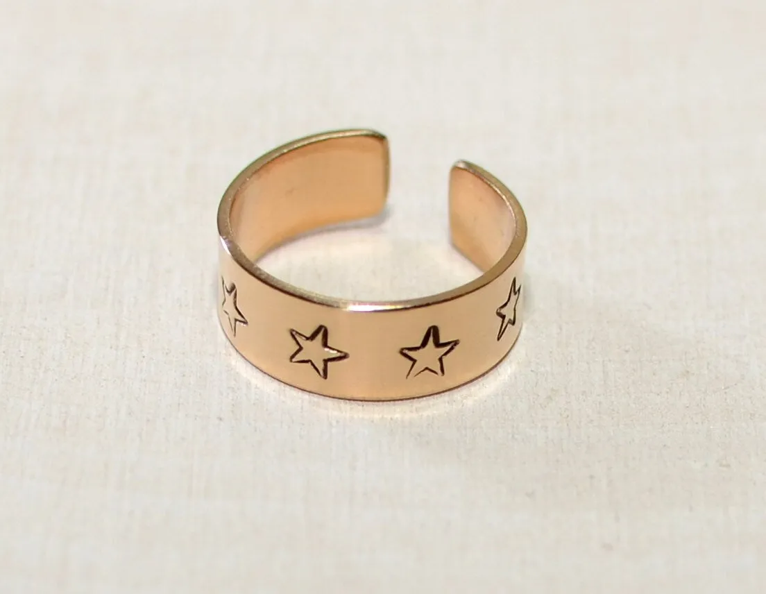 14K toe ring with stars stamped in solid gold