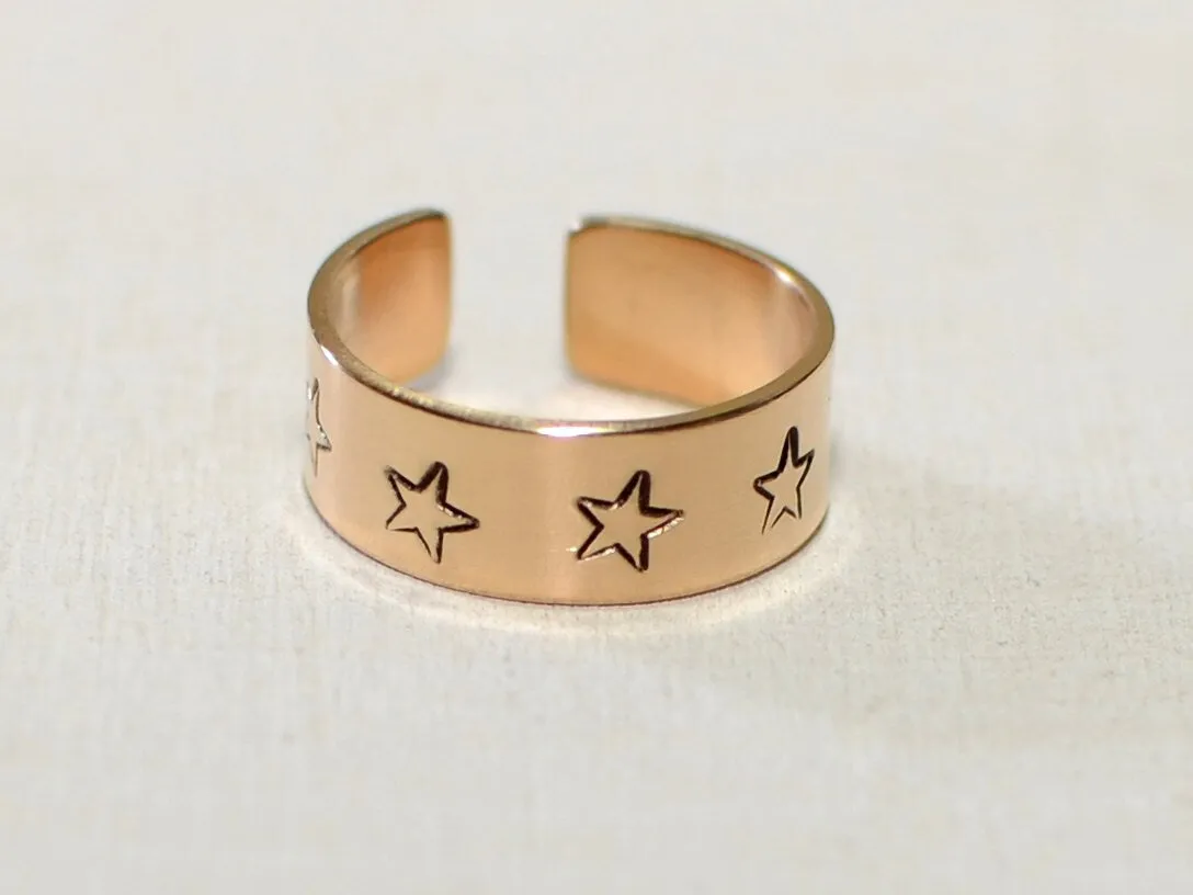 14K toe ring with stars stamped in solid gold
