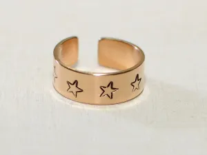 14K toe ring with stars stamped in solid gold