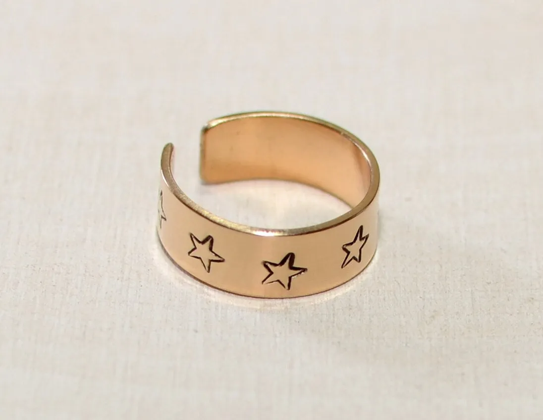 14K toe ring with stars stamped in solid gold