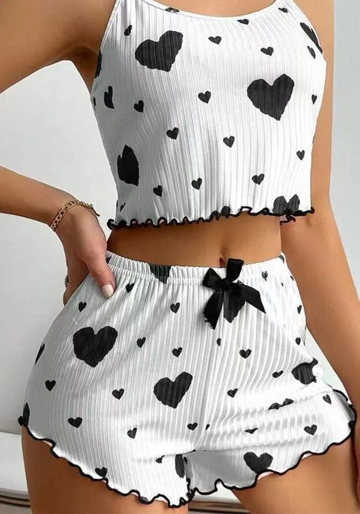 Playful Heart Print Two-Piece Pajama Set with Ruffled Edges