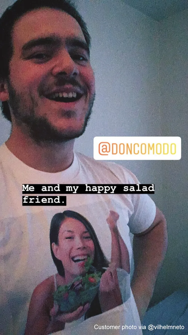 Smiling woman eating a healthy vegetable salad